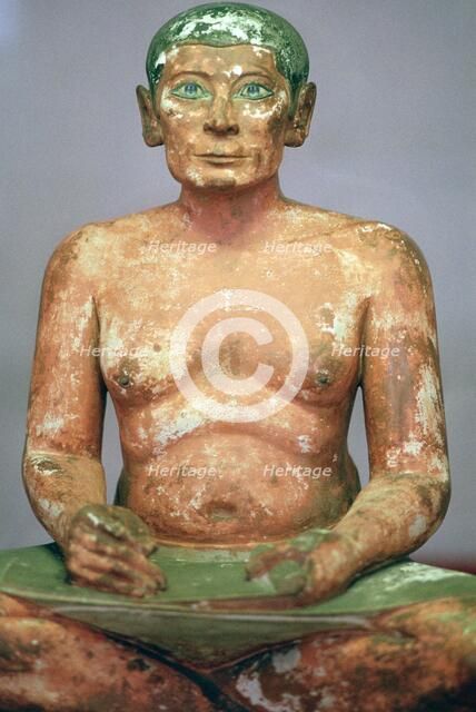 Egyptian seated scribe model. Artist: Unknown