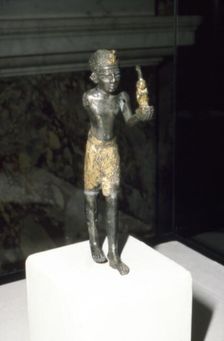 Egyptian Statuette of King Seti I offering image of Maat, New Kingdom, c13th century BC