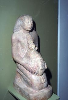 Egyptian Surveyor with coiled rope for measuring, 1400 BC