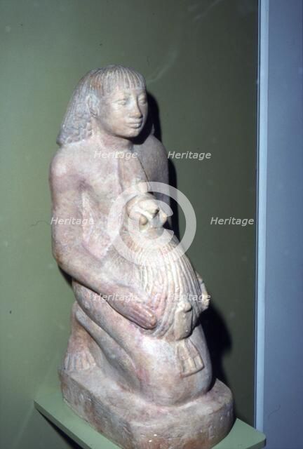 Egyptian Surveyor with coiled rope for measuring, 1400 BC. Artist: Unknown.