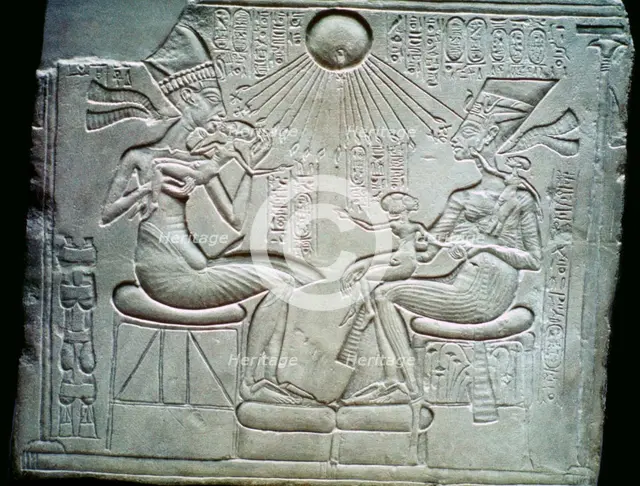 Egyptian relief of Akhenaten and Nefertiti holding their daughters, 14th century BC. Artist: Unknown