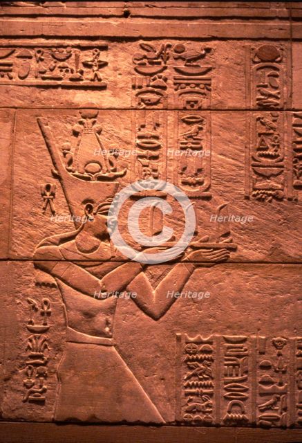Egyptian relief of Emperor Augustus (Roman) as Pharaoh, offering to Isis, c1st century. Artist: Unknown.