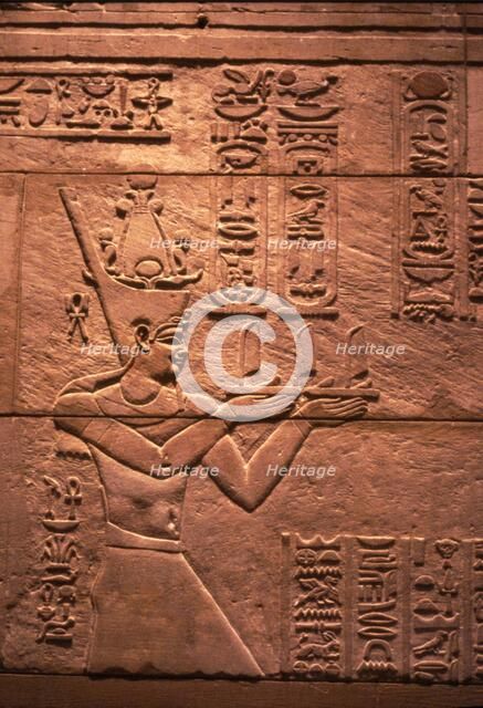 Egyptian relief of Emperor Augustus (Roman) as Pharaoh, offering to Isis, c1st century. Artist: Unknown.