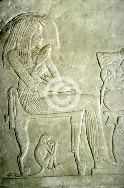 Egyptian Relief. Seated Lady with elaborate hairstyle.  Artist: Unknown.