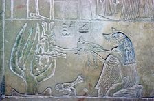 Egyptian relief showing a dead woman and Hathor