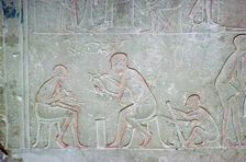 Egyptian relief showing vase painters, 14th century BC