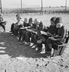 Eight boys at Lincoln Bench School, near Ontario, Malheur County, Oregon, 1939. Creator: Dorothea Lange