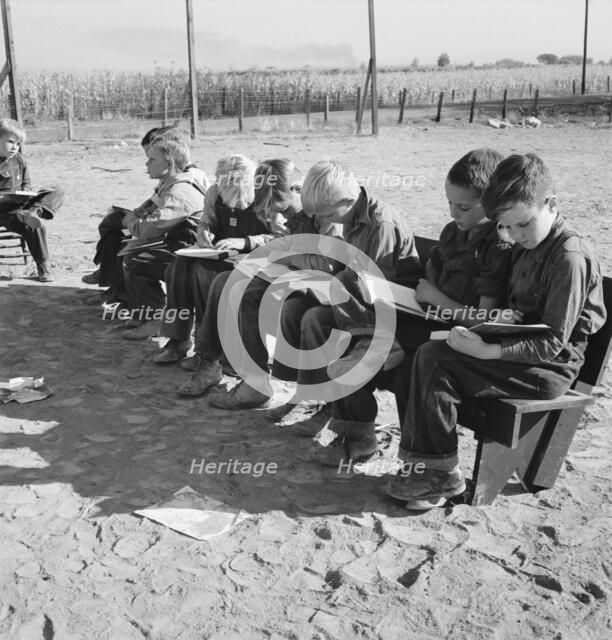 Eight boys at Lincoln Bench School, near Ontario, Malheur County, Oregon, 1939. Creator: Dorothea Lange.