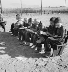 Eight boys at Lincoln Bench School, near Ontario, Malheur County, Oregon, 1939. Creator: Dorothea Lange