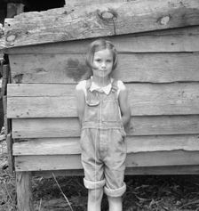 Eight year old daughter who helps about the tobacco barn..., Granville County, North Carolina, 1939. Creator: Dorothea Lange