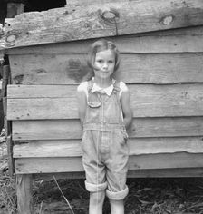 Eight year old daughter who helps about the tobacco barn..., Granville County, North Carolina, 1939. Creator: Dorothea Lange