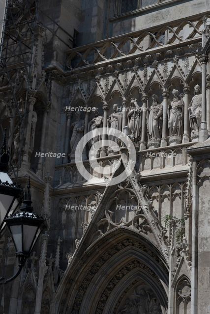 Elaborate figure entrance to the Votivkirche, Vienna, Austria, 2022. Creator: Ethel Davies.