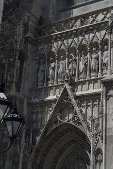Elaborate figure entrance to the Votivkirche, Vienna, Austria, 2022. Creator: Ethel Davies