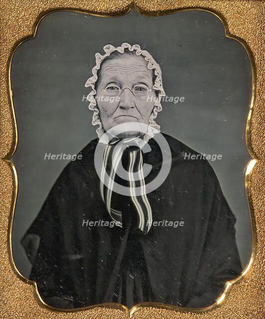 Elderly Woman Wearing Glasses and a Soft Bonnet, 1850s. Creator: Unknown.