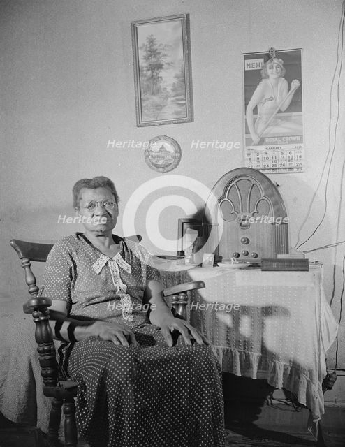 Elderly lady who lives on Lamont Street, N.W., Washington, D.C., 1942. Creator: Gordon Parks.
