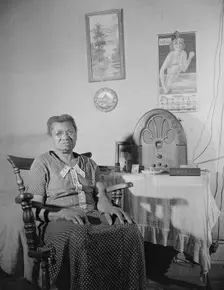 Elderly lady who lives on Lamont Street, N.W., Washington, D.C., 1942. Creator: Gordon Parks