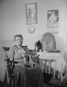 Elderly lady who lives on Lamont Street, N.W., Washington, D.C., 1942. Creator: Gordon Parks