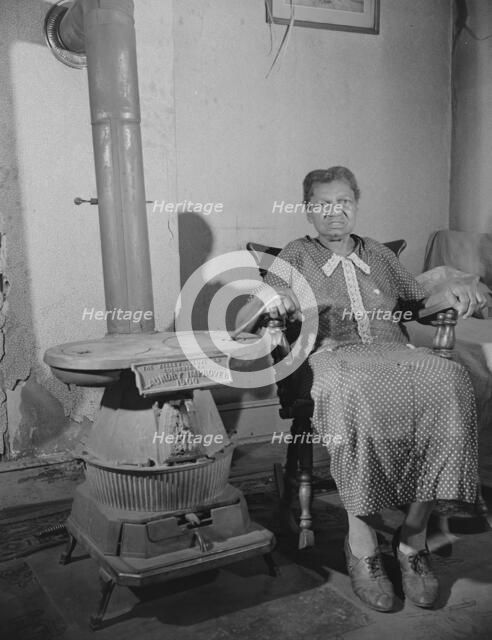 Elderly lady who lives on Lamont Street, N.W., Washington, D.C., 1942. Creator: Gordon Parks.