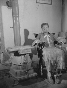 Elderly lady who lives on Lamont Street, N.W., Washington, D.C., 1942. Creator: Gordon Parks