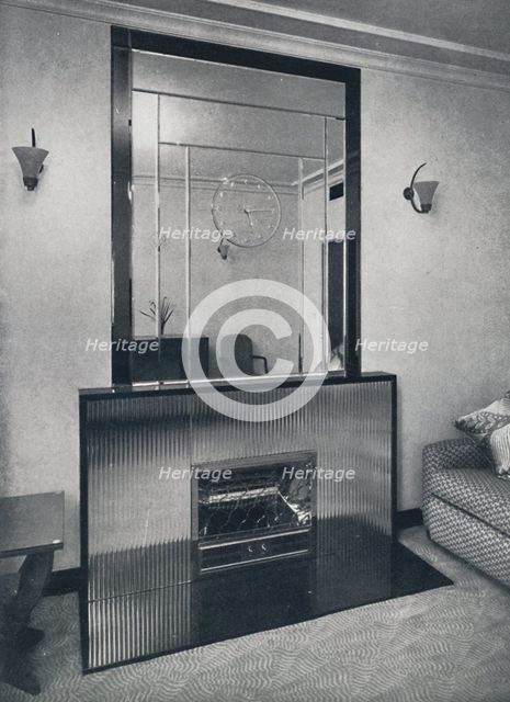 'Electric fireplace and overmantel by James Clark & Son Ltd.', 1940. Artist: Unknown.
