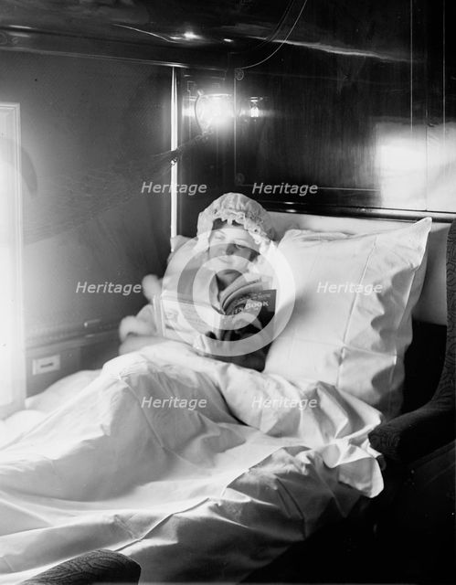Electric-lighted berth on a deluxe overland limited train, between 1910 and 1920. Creator: William H. Jackson.