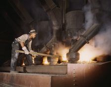 Electric phosphate smelting furnace used to make element...vicinity of Muscle Shoals, Alabama, 1942. Creator: Alfred T Palmer