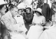 Eleanor Wilson, daughter of Woodrow Wilson, with her sister Jessie and others, c1914. Creator: Bain News Service
