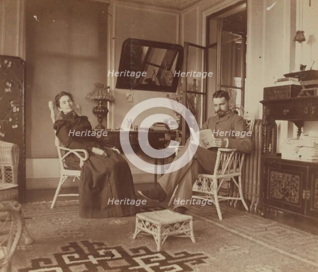 Eleanor and Frederick Pray, seated in the veranda room, Dom Smith, Vladivostok, Russia, 1900. Creator: Maud Morphew.