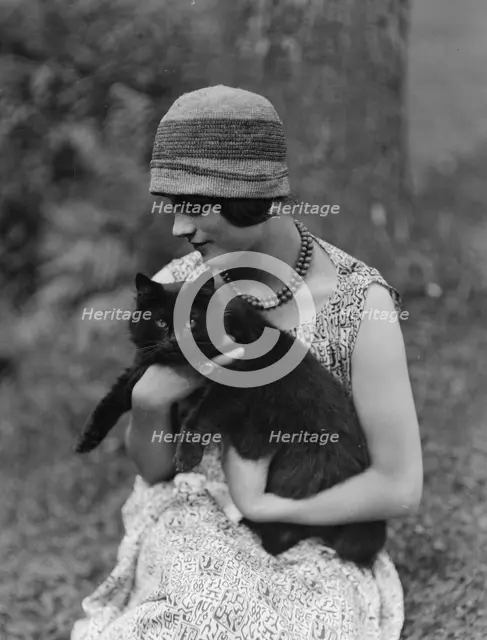 Elizabeth Duncan dancer, with cat, portrait photograph, 1926 Creator: Arnold Genthe.