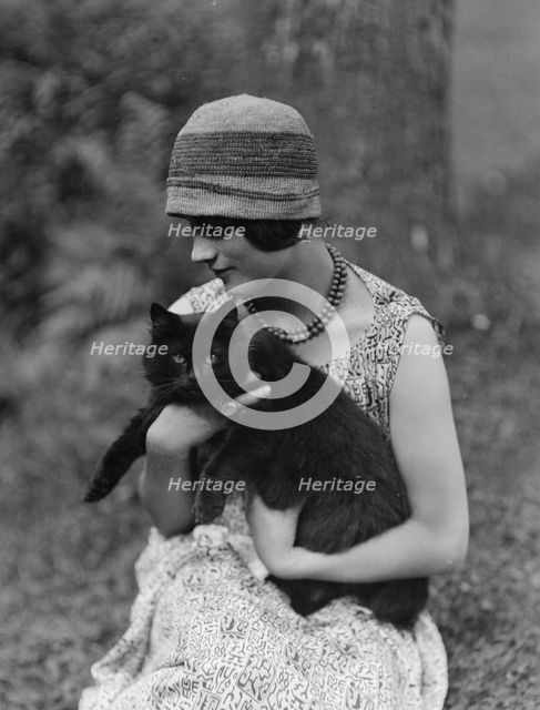Elizabeth Duncan dancer, with cat, portrait photograph, 1926 Creator: Arnold Genthe.