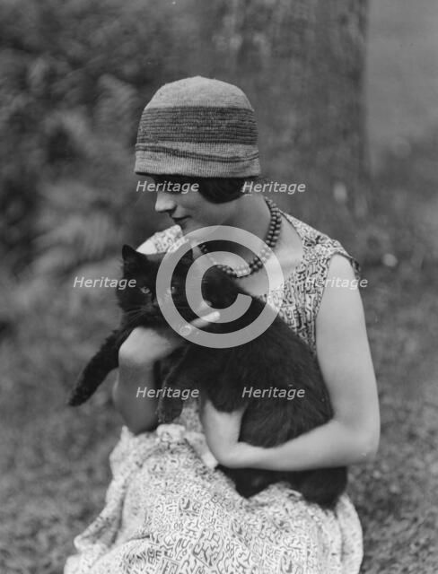 Elizabeth Duncan dancer, with cat, portrait photograph, 1926 Creator: Arnold Genthe.