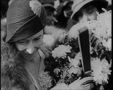 Elizabeth, Her Majesty the Queen of the Belgians Receiving Flowers, 1930s. Creator: British Pathe Ltd