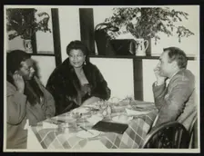 Ella Fitzgerald with her sister and record producer and impresario Norman Granz, Bristol, 1955. Creator: Denis Williams
