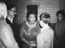 Ella Fitzgerald with Max Jones, London, 1961. Creator: Brian Foskett