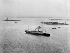Ellis Island and Harbor, New York, c.between 1900 and 1920. Creator: Unknown