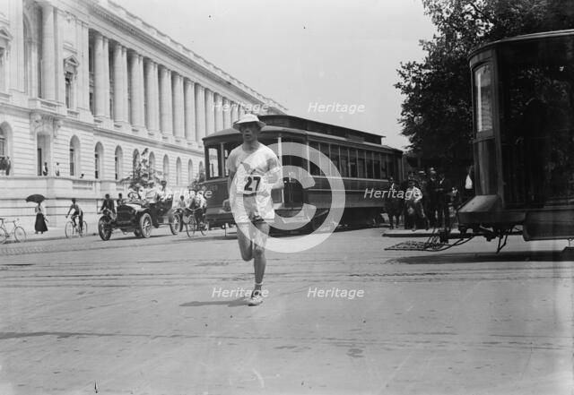 Elphinstone Winning Washington marathon, 1911. Creator: Bain News Service.