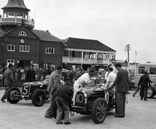ERA and Charles Mortimer's Bugatti Type 35B at Brooklands, Surrey, 1939. Artist: Bill Brunell