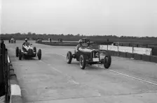 ERA and Maserati at Brooklands. Artist: Bill Brunell