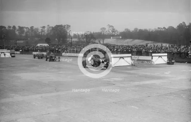 ERA cars of Jock Manby-Colegrave and Raymond Mays, JCC International Trophy, Brooklands, 2 May 1936. Artist: Bill Brunell.