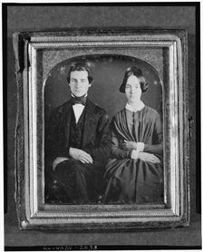 Erasmus Darwin and Emily Cooper, three-quarter length portrait, seated, between 1840 and 1860. Creator: Unknown