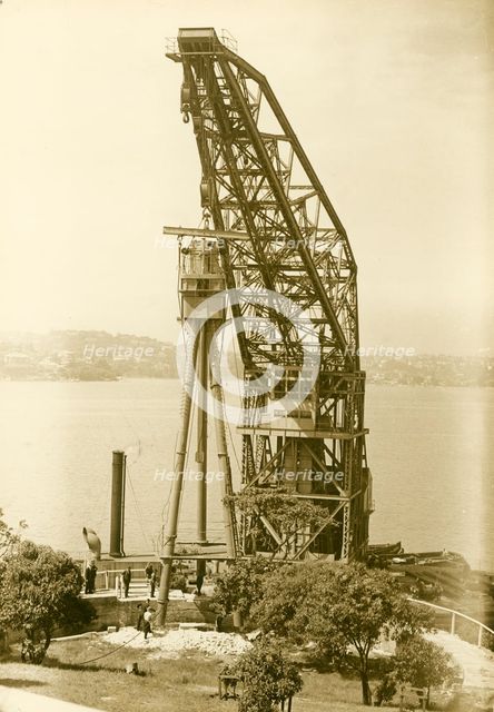 Erection of H.M.A.S. Sydney's mast, Bradleys Head, 1934. Creator: Unknown.