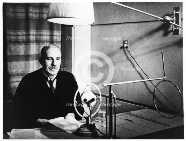 Ernest Rutherford broadcasting during a home visit to New Zealand in 1926.   Artist: Anon