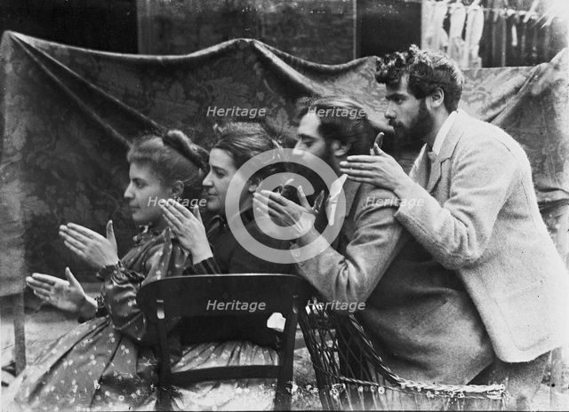Esther Pissarro, Alice Isaacson, Lucien and Georges Pissarro pretending to be a train, 1890. Creator: Unknown.