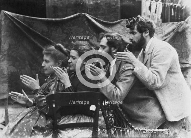 Esther Pissarro, Alice Isaacson, Lucien and Georges Pissarro pretending to be a train, 1890. Creator: Unknown.