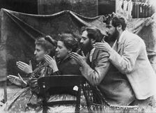 Esther Pissarro, Alice Isaacson, Lucien and Georges Pissarro pretending to be a train, 1890. Creator: Unknown