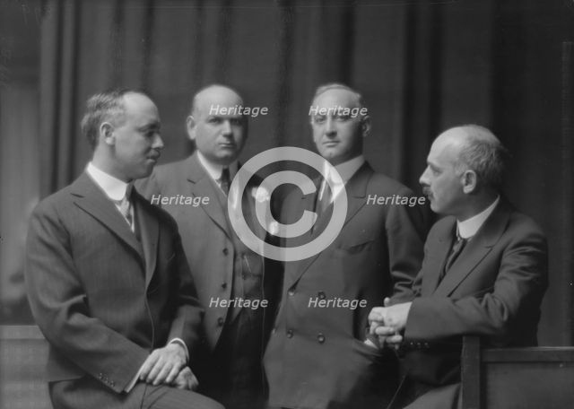 Esberg, Mr., Mr. Melton, and two unidentified men, portrait photograph, 1915 Jan. Creator: Arnold Genthe.