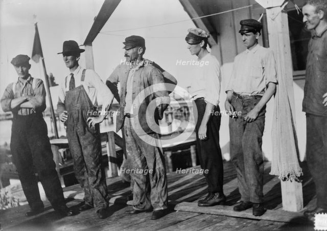 Escaped from Tampico, in launch, 1914. Creator: Bain News Service.