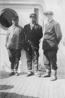Eskimo boy in center who went with Mr. Lapp [i.e. Mr. William Thomas Lopp] on relief..., c1900-c1930 Creator: Unknown
