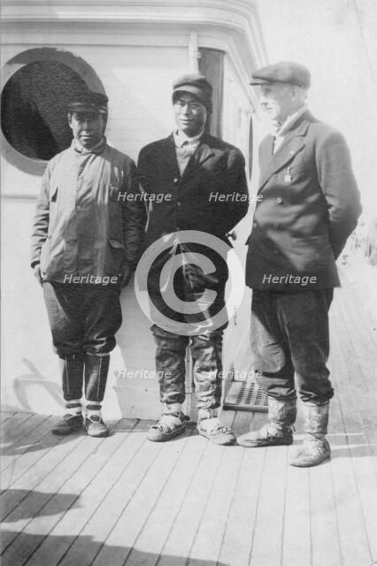 Eskimo boy in center who went with Mr. Lapp [i.e. Mr. William Thomas Lopp] on relief..., c1900-c1930 Creator: Unknown.