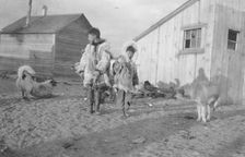 Eskimo boys with dogs, between c1900 and 1916. Creator: Unknown